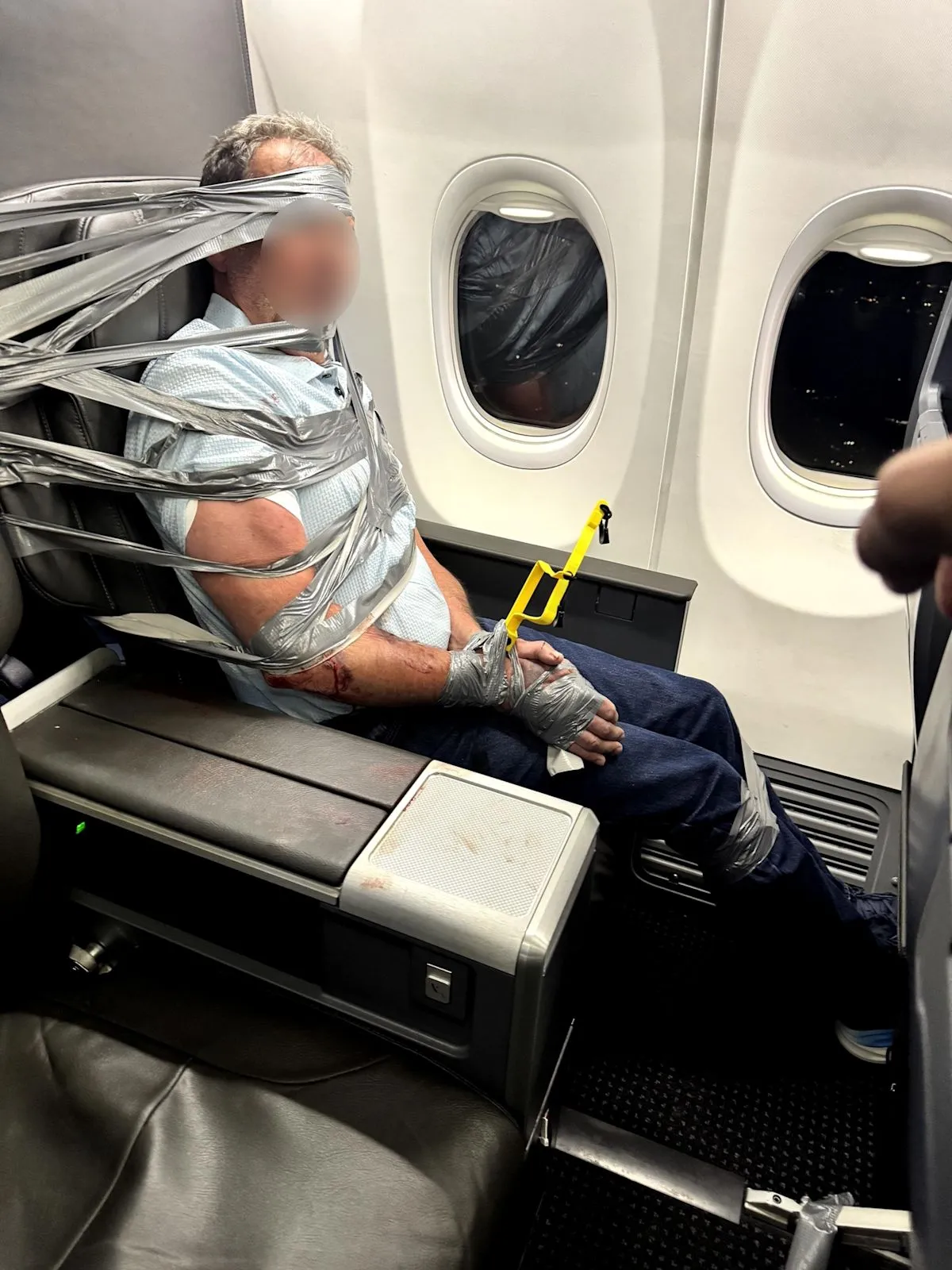 Unruly Passenger Restrained With Duct Tape on AA Flight